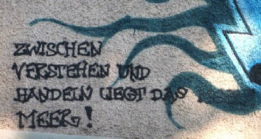 'zwischen verstehen und handeln liegt das meer'. graffiti ksnacht zrich schweiz