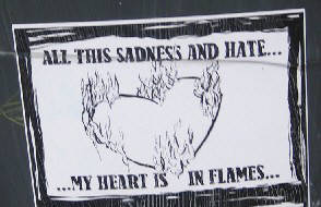 ALL THIS SADNESS AND HATE. MY HEART IS IN FLAMES. street art sticker zurich switzerland 2010